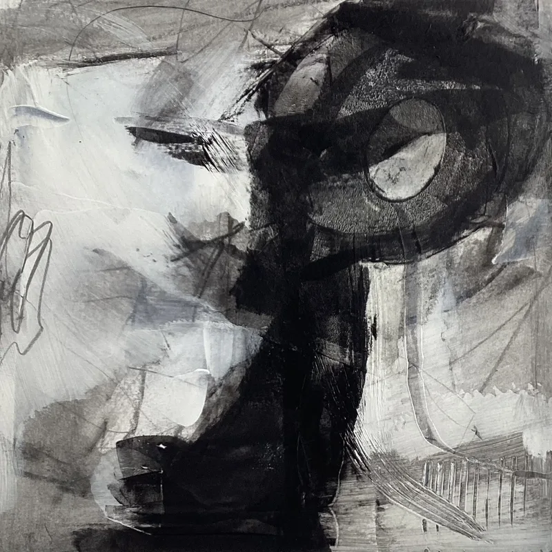 Charcoal abstract with a dark circular form and ruled marks along the base.